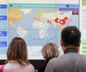 epa08264568 A view of a map of the world displayed on a screen showing the evolution of the novel coronavirus Covid-19 outbreak, at the Emergency Response Coordination Centre (ERCC) in Brussels, Belgium, 02 March 2020.  EPA/STEPHANIE LECOCQ