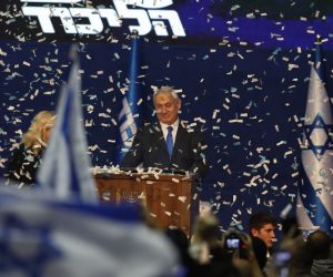 epa08265691 Israeli Prime Minister and Chairman of the Likud Party Benjamin Netanyahu (C) attends a Likud party final election event after early exit polls, in Tel Aviv, Israel, 03 March 2020. It is the third Israeli parliament election in one year.  EPA/ATEF SAFADI
