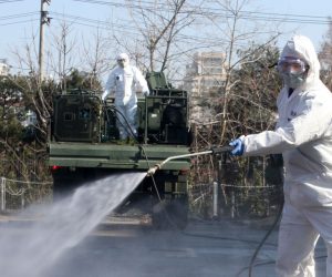 epa08270906 South Korean soldiers spray disinfectant as a precaution against the novel coronavirus outbreak, at the Seoul Human Resources Development Center in Seoul, South Korea, 05 March 2020. With over 5,500 confirmed cases of COVID-19, South Korea currently accounts for the highest number of infections outside mainland China  EPA/KIM CHUL-SOO