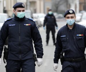 epa08284107 Romanian police officers wearing protective masks guard the perimeter of the Dr. Professor Dimitrie Gerota Emergency Hospital after the building was put into quarantine following a coronavirus positive, in Bucharest, Romania, 10 March 2020. A 60-year-old man who was admitted on 05 March to the hospital tested positive for the COVID-19 disease caused by the SARS-CoV-2 coronavirus. The Romanian capital has so far seen at least seven confirmed cases of infection, three of them related to the Gerota Hospital.  EPA/ROBERT GHEMENT