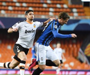 epa08284653 A handout image provided by UEFA shows Goncalo Guedes (L) of Valencia tackling Hans Hateboer (R) of Atalanta during the UEFA Champions League round of 16 second leg match between Valencia CF and Atalanta BC at Estadio Mestalla in Valencia, Spain, 10 March 2020. The match takes place behind closed doors due to the coronavirus (COVID-19) outbreak.  EPA/UEFA / HO **SHUTTERSTOCK OUT** HANDOUT NO SALES/NO ARCHIVES