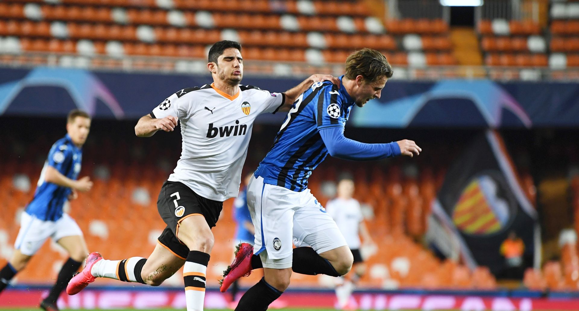 epa08284653 A handout image provided by UEFA shows Goncalo Guedes (L) of Valencia tackling Hans Hateboer (R) of Atalanta during the UEFA Champions League round of 16 second leg match between Valencia CF and Atalanta BC at Estadio Mestalla in Valencia, Spain, 10 March 2020. The match takes place behind closed doors due to the coronavirus (COVID-19) outbreak.  EPA/UEFA / HO **SHUTTERSTOCK OUT** HANDOUT NO SALES/NO ARCHIVES