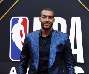 epa08288214 (FILE) - French basketball player Rudy Gobert poses for photographers upon his arrival for the 2019 NBA Awards at Barker Hangar in Santa Monica, California, USA, 24 June 2019 (re-issued 12 March 2020). Utah Jazz center Rudy Gobert tested positive for COVID-19 it was announced 11 March 2020. The test result was announced just before tip-off of the Utah Jazz and Oklahoma City Thunder game at Chesapeake Bay Arena in Oklahoma City. The game was called off and shortly thereafter the National Basketball Association (NBA) announced the suspension of the 2020 season.  EPA/ETIENNE LAURENT  SHUTTERSTOCK OUT *** Local Caption *** 55296762