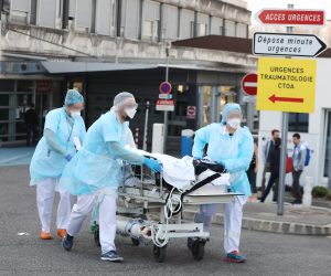 epa08304850 A patient on a gurney is evacuated by medical helicopter on another French hospital at the Emile Muller hospital in Mulhouse, eastern France, 17 March 2020 (issued 18 March 2020). France is under lockdown in an attempt to stop the widespread of the SARS-CoV-2 coronavirus causing the Covid-19 disease.  EPA/VINCENT VOEGTLIN FRANCE OUT / SHUTTERSTOCK OUT