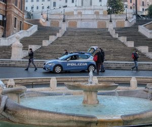 epa08306269 Italian police perform checks on locals found out on the streets, in front of Trinita dei Monti at Piazza di Spagna Rome, Italy, 19 March 2020. Italy has reported at least 35,713 confirmed cases of the COVID-19 disease caused by the SARS-CoV-2 coronavirus and 2,978 deaths so far. The Mediterranean country remains in total lockdown as the pandemic disease spreads through Europe.  EPA/ALESSANDRO DI MEO