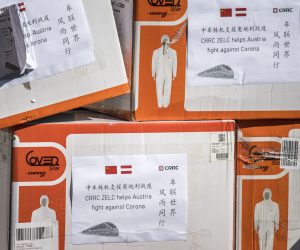 epa08309574 Boxes of protective suits and masks are pictured in Vienna, Austria, 20 March 2020. China Railway Rolling Stock Corporation (CRRC) has donated 3.000 protective suits and 150.000 masks to the Samaritan Team Austria (Arbeiter Samariter Bund Oesterreich). Austrian Chancellor Sebastian Kurz announced an extension of the preventive measures aimed at slowing down the ongoing pandemic of the COVID-19 disease caused by the SARS-CoV-2 coronavirus, earlier this day. These measures, which include restricting the movement of individuals and shuttering commercial establishments, are now set to last until at least Easter Monday, 13 April 2020.  EPA/CHRISTIAN BRUNA