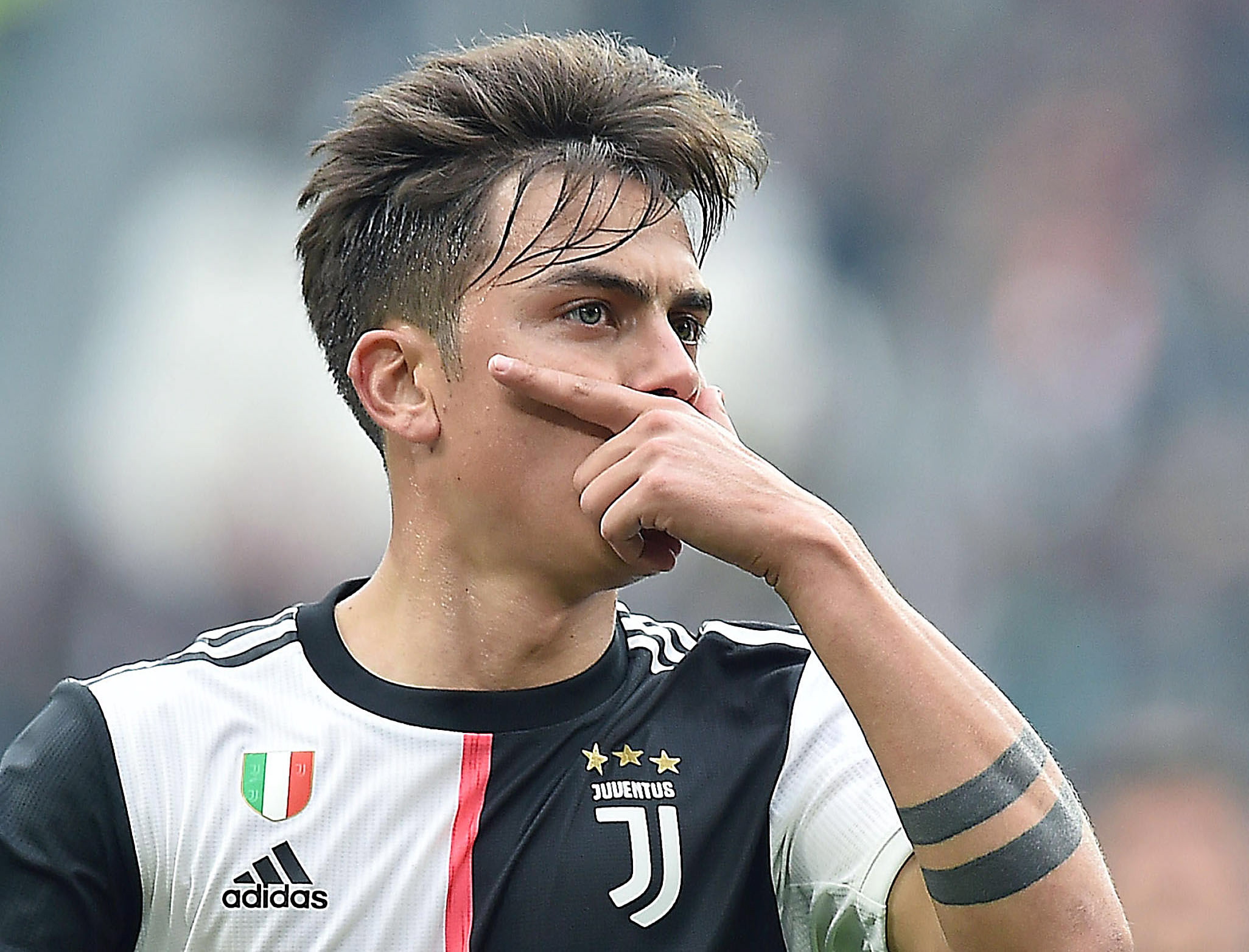 epa08312198 (FILE) Juventus’ player Paulo Dybala celebrates after scoring during the Italian Serie A soccer match Juventus FC vs Brescia Calcio at the Allianz stadium in Turin, Italy, 16 February 2020.  According to reports on 21 March 2021, Paulo Dybala has tested positive for COVID-19. He is in voluntary home isolation and he is asymptomatic.  EPA/ALESSANDRO DI MARCO