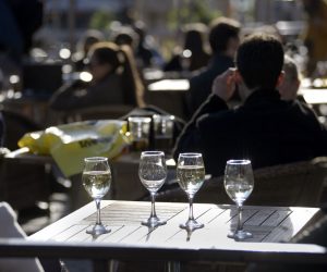epa08324735 People sit at an outdoor restaurant at a square in central Stockholm, Sweden, 26 March 2020. Despite the coronavirus outbreak around the world, people gather to enjoy the sun.  EPA/Janerik Henriksson  SWEDEN OUT