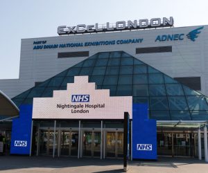 epa08325933 A general view of the entrance of the temporary NHS Nightingale Hospital at the Excel Centre in London, Britain, 27 March 2020. The British government has announced that the Excel Centre, an exhibition centre in Central London will be converted to a temporary NHS hospital named the Nightingale Hospital, to treat coronavirus Covid-19 cases. Countries around the world is taking increased measures to stem the widespread of the SARS-CoV-2 coronavirus which causes the Covid-19 disease.  EPA/VICKIE FLORES