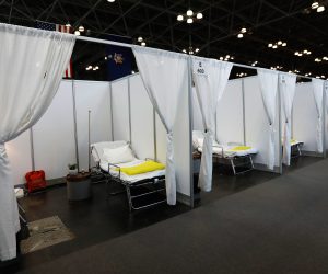 epa08327203 The makeshift medical facility on display for potential coronavirus covid-19 patients at the Jacob Javits Convention Center in New York, New York, USA, 27 March 2020. New York City is now an epicenter of coronavirus COVID-19, the disease caused by the virus, New York City has reported over 20,000 confirmed cases and more than 500 deaths.  EPA/Peter Foley