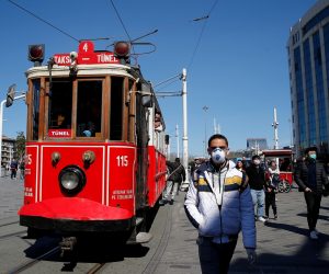 People wearing protective face masks walk at Taksim square in central Istanbul People wearing protective face masks walk at Taksim square in central Istanbul, Turkey, March 17, 2020. REUTERS/Kemal Aslan KEMAL ASLAN