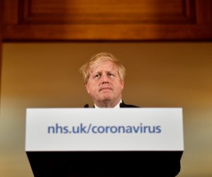 British PM Johnson gives daily address to nation on coronavirus in London British Prime Minister Boris Johnson looks on during a coronavirus disease (COVID-19) news conference inside 10 Downing Street, London, Britain March 19, 2020.  Leon Neal/Pool via REUTERS POOL