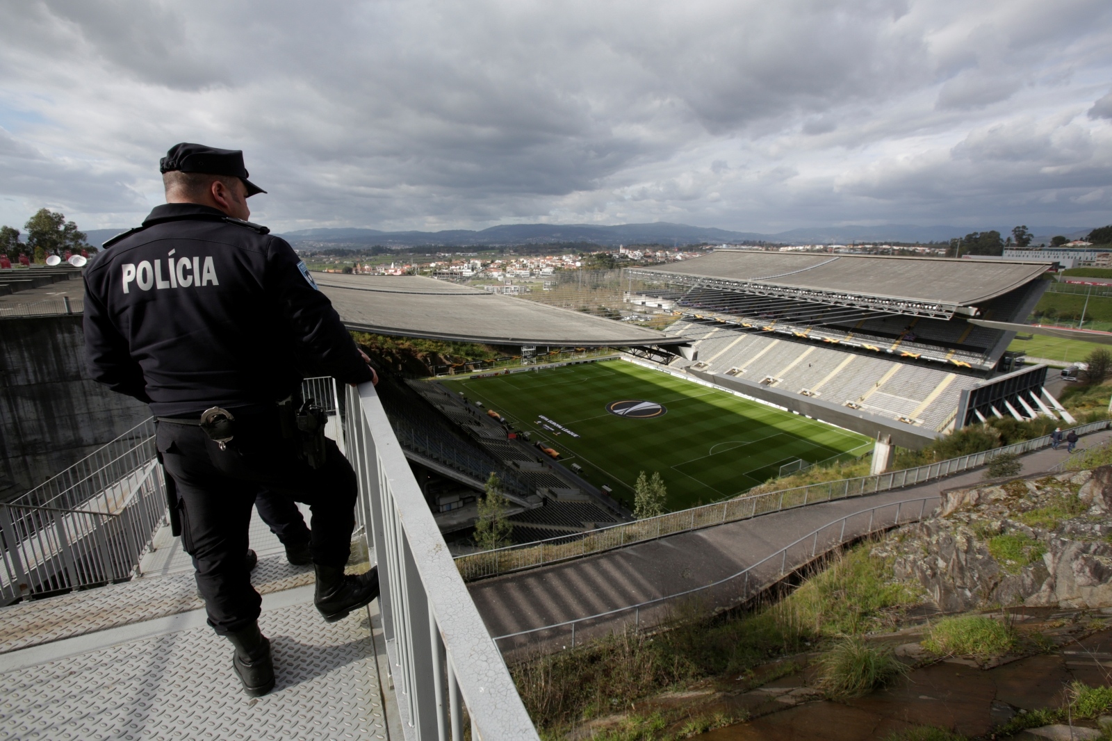 Europa League - Round of 32 Second Leg - S.C. Braga v Rangers Soccer Football - Europa League - Round of 32 Second Leg - S.C. Braga v Rangers - Estadio Municipal de Braga, Braga, Portugal - February 26, 2020  A police officer looks over the stadium before the match  REUTERS/Miguel Vidal MIGUEL VIDAL