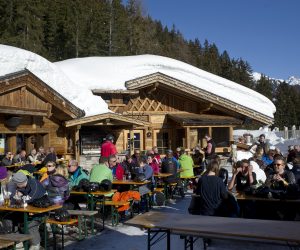 epa08293578 (FILE) - Tourists enjoy a sunny winter day in front of a restaurant at a ski resort in St. Anton am Arlberg, Austria, 12 January 2012 (reissued 14 March 2020). According to reports, the Austrian government has put popular touristic areas, Heiligenblut am Grossglockner, Paznautal, including Ischgl, and St. Anton under quarantine amid the ongoing Coronavirus crisis.  EPA/STR AUSTRIA OUT