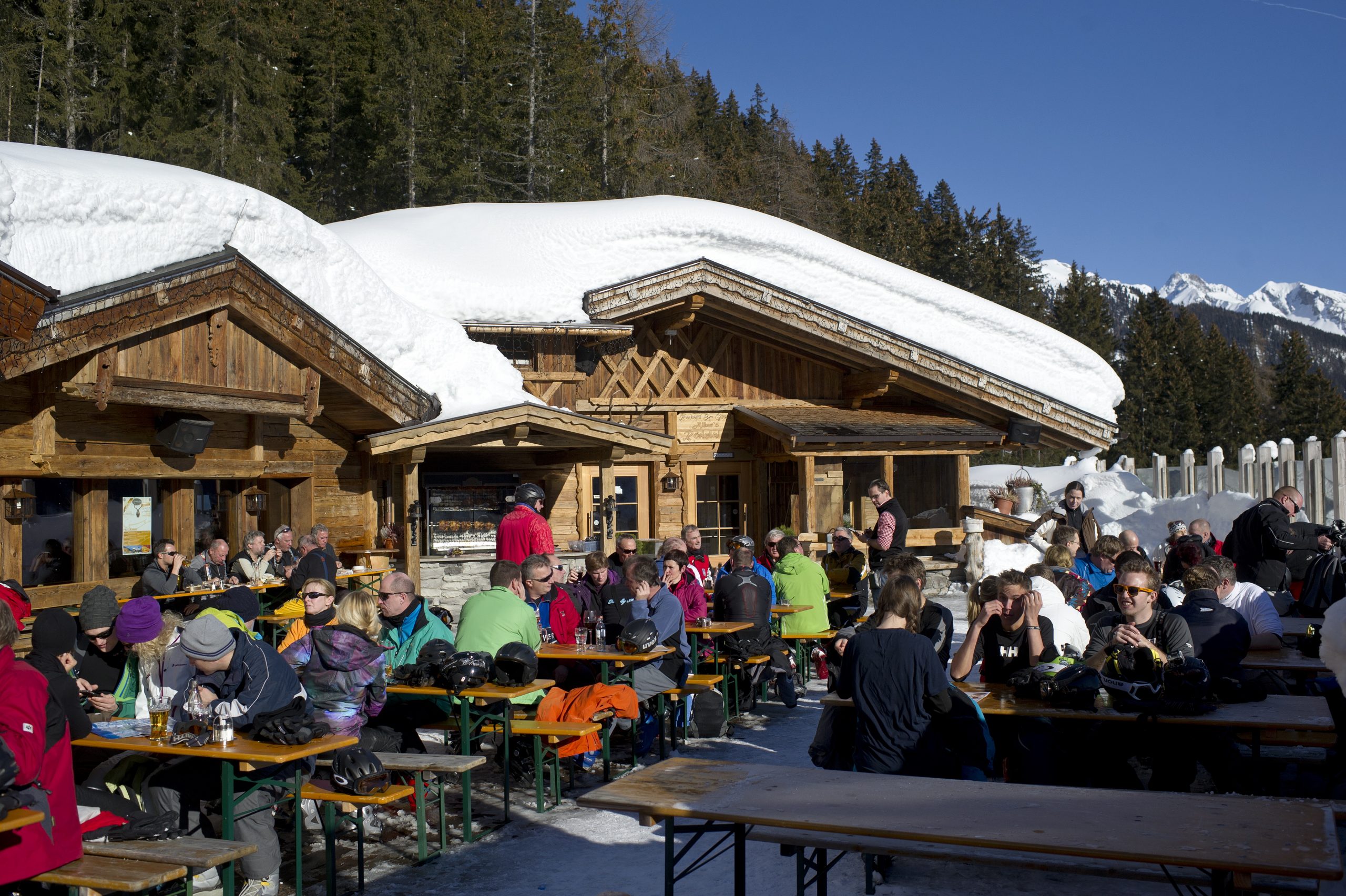 epa08293578 (FILE) - Tourists enjoy a sunny winter day in front of a restaurant at a ski resort in St. Anton am Arlberg, Austria, 12 January 2012 (reissued 14 March 2020). According to reports, the Austrian government has put popular touristic areas, Heiligenblut am Grossglockner, Paznautal, including Ischgl, and St. Anton under quarantine amid the ongoing Coronavirus crisis.  EPA/STR AUSTRIA OUT