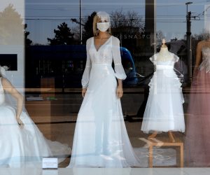 epa08297484 Mannequins dressed with face masks are displayed in the window of a wedding dress salon in Zagreb, Croatia, 16 March 2020. According to reports on 16 March 2020, Croatia has 49 confirmed cases of COVID-19 caused by coronavirus.  EPA/ANTONIO BAT