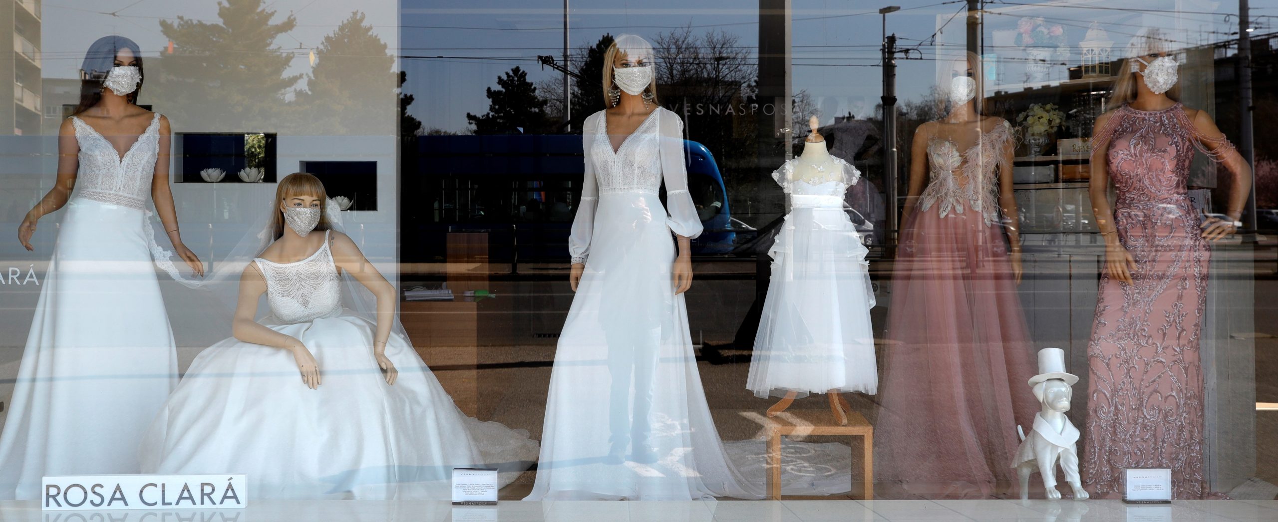 epa08297484 Mannequins dressed with face masks are displayed in the window of a wedding dress salon in Zagreb, Croatia, 16 March 2020. According to reports on 16 March 2020, Croatia has 49 confirmed cases of COVID-19 caused by coronavirus.  EPA/ANTONIO BAT