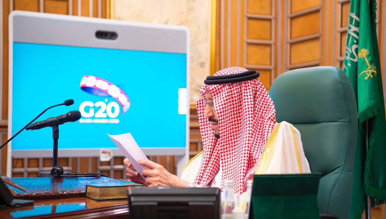 epa08324352 A handout photo made available by the Saudi Royal Court shows Saudi King Salman bin Abdulaziz taking part via a video conference in Extraordinary Virtual G20 Leaders' Summit in Riyadh, Saudi Arabia, 26 March 2020. The summit is dedicated to fighting with the pandemic COVID-19 disease caused by SARS-CoV-2 coronavirus and its impact on the global economy.  EPA/BANDAR ALJALOUD / HANDOUT  HANDOUT EDITORIAL USE ONLY/NO SALES