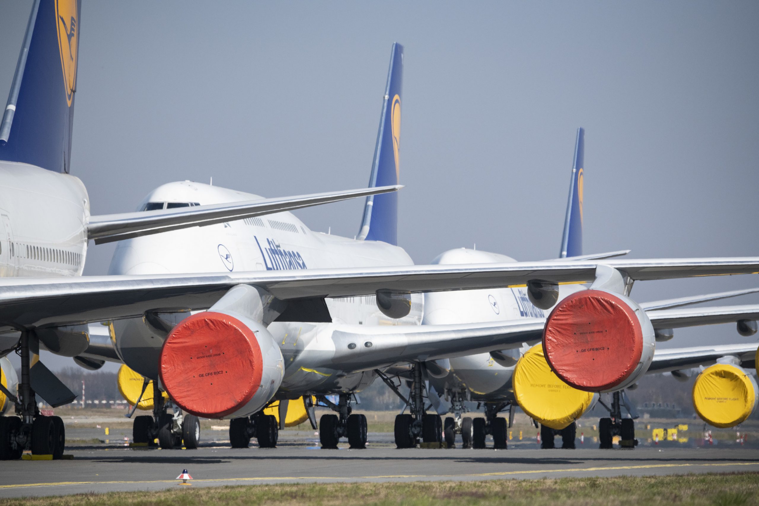 02 April 2020, Hessen, Frankfurt_Main: Lufthansa aircrafts stand on the runway at Frankfurt Airport as Lufthansa will extend its reduced schedule by two weeks, up to May 3 due to the coronavirus outbreak. Photo: Boris Roessler/dpa/Boris Roessler/dpa