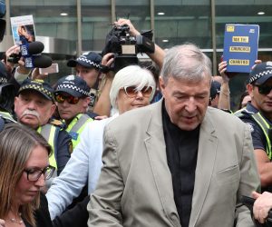 epa08346431 (FILE) - Australian Cardinal George Pell (C) leaves the County Court in Melbourne, Victoria, Australia, 26 February 2019 (reissued 06 April 2020). The Australian high court on 07 April 2020 is set to rule on Cardinal George Pell's final appeal to overturn his conviction for child sexual abuse. Pell is serving a six-year jail sentence for abusing two boys in the 1990s.  EPA/DAVID CROSLING AUSTRALIA AND NEW ZEALAND OUT