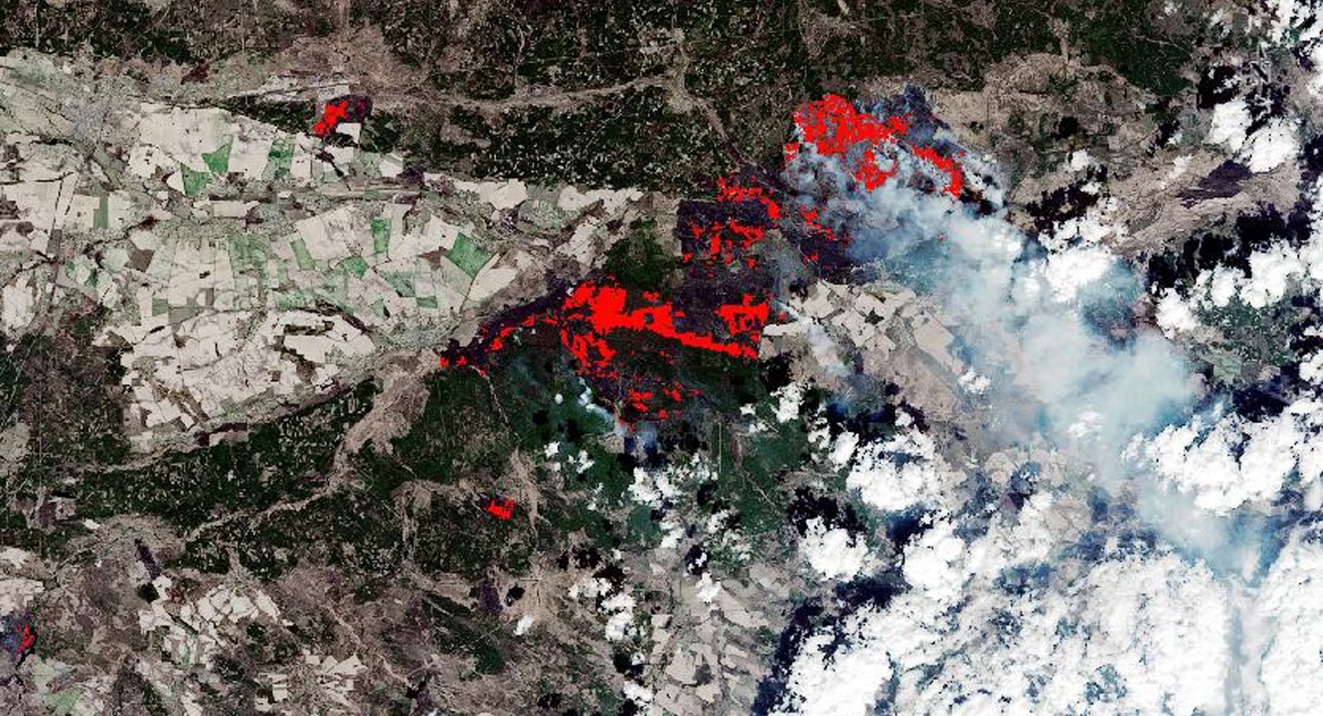epa08369404 A handout picture made available by the European Space Agency (ESA) shows the burned area around Chernobyl, Ukraine, 10 April 2020, following an outbreak of wildfires (issued 17 April 2020). This extract of a burned area mapping product was generated by CIMA Foundation and Fadeout using the WASDI processing environment. It is based on images acquired by Copernicus Sentinel-2 on 26 March and 10 April 2020.  EPA/ESA HANDOUT -- contains Copernicus Sentinel data (2020), processed by CIMA Foundation and Fadeout srl -- HANDOUT EDITORIAL USE ONLY/NO SALES