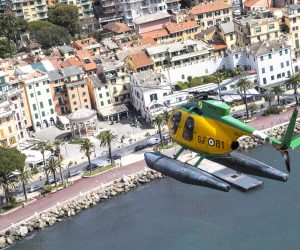 epa08370253 An aerial view shows a Guardia di Finanza (GdF, Economic and Financial Police) helicopter during a patrolling flight of the Ligurian Riviera, in Genoa, northern Italy, 18 April 2020, during a nationwide lockdown over the coronavirus disease (COVID-19) pandemic. Countries around the world are taking increased measures to stem the widespread of the SARS-CoV-2 coronavirus which causes the COVID-19 disease.  EPA/LUCA ZENNARO