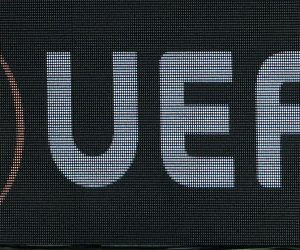 FILED - 29 November 2018, Hessen, Frankfurt_Main: The UEFA logo displayed on an advertising board during the UEFA Europa League Group H soccer match between Eintracht Frankfurt and Olympique Marseille at the Commerzbank-Arena. UEFA on Tuesday reiterated its recommendation to members to complete their leagues amid the coronavirus pandemic but is seemingly also ready to look into possible cancellations in certain circumstances. Photo: Silas Stein/dpa