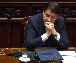 epa08375959 Italian Prime Minister Giuseppe Conte reacts after he communicated the recent government initiatives to the deputies to cope with the COVID-19 pandemic in the Montecitorio hall in Rome, Italy, 21 April 2020.  EPA/MAURIZIO BRAMBATTI