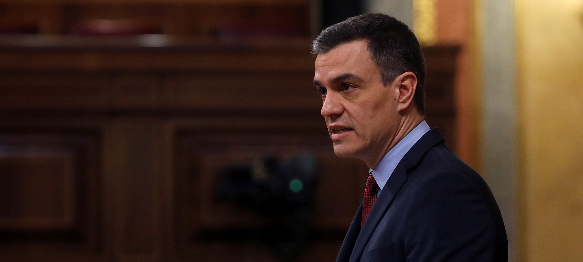 epa08376602 Spanish Prime Minister Pedro Sanchez delivers a speech during a Spanish Government's question time session at the Lower Chamber of Spanish Parliament, in Madrid, Spain, 22 April 2020. The government will expound the results of the latest European Council meetings and the reasons to ask for a new extension of the state of alarm declared amid the coronavirus pandemic.  EPA/J.J. GUILLEN