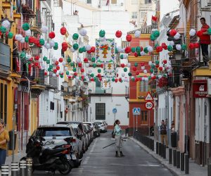 epa08384561 A view of the decorated and popular Triana Street on occasion of April's Fair in Sevilla, Spain, 25 April 2020. The April's Fair of Sevilla had to be canceled amid the national lockdown to avoid the spreading of pandemic of the COVID-19 disease caused by the SARS-CoV-2 coronavirus.  EPA/Jose Manuel Vidal