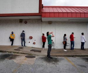 The spread of the coronavirus disease (COVID-19), in Fayetteville People who lost their jobs wait in line to file for unemployment following an outbreak of the coronavirus disease (COVID-19), at an Arkansas Workforce Center in Fayetteville, Arkansas, U.S. April 6, 2020. REUTERS/Nick Oxford NICK OXFORD