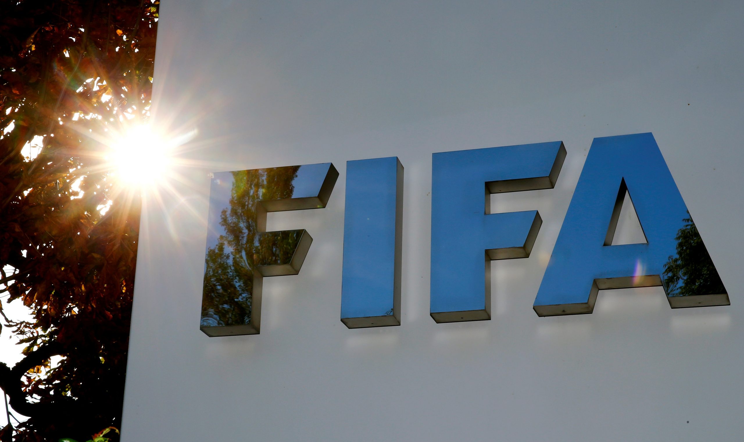 FILE PHOTO: Logo of FIFA is seen in Zurich FILE PHOTO: The logo of FIFA is seen in front of its headquarters in Zurich, Switzerland September 26, 2017.   REUTERS/Arnd Wiegmann/File Photo Arnd Wiegmann