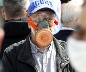 epa08393624 A Bosnian man wears a protective face mask amid the ongoing coronavirus COVID-19 pandemic in Sarajevo, Bosnia and Herzegovina, 30 April 2020. Countries around the world are taking increased measures to stem the widespread of the SARS-CoV-2 coronavirus which causes the COVID-19 disease.  EPA/FEHIM DEMIR