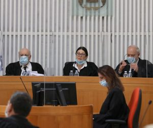 epa08400252 A panel of judges of the Israeli Supreme Court wearing face masks adresses a crucial discussion on a petition asking whether Prime Minister Benjamin Netanyahu can form a government legally and publicly when indictments are filed against him on a charges of fraud, bribery and breach of trust, at the  Israeli Supreme Court in Jerusalem, Israel, 04 May 2020.  EPA/ABIR SULTAN / POOL
