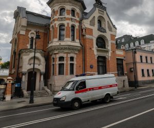 epa08407570 A ambulance car drives in a deserted street amid the ongoing coronavirus COVID-19 pandemic in Moscow, Russia, 07 May 2020. Russian President Vladimir Putin extended a home quarantine to 11 May 2020 to prevent the spread of the SARS-CoV-2 coronavirus which causes the COVID-19 disease.  EPA/YURI KOCHETKOV