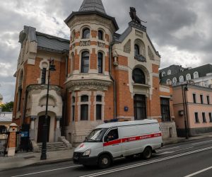 epa08407570 A ambulance car drives in a deserted street amid the ongoing coronavirus COVID-19 pandemic in Moscow, Russia, 07 May 2020. Russian President Vladimir Putin extended a home quarantine to 11 May 2020 to prevent the spread of the SARS-CoV-2 coronavirus which causes the COVID-19 disease.  EPA/YURI KOCHETKOV