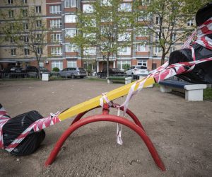 epa08419496 View of a seesaw covered in official tape at a closed playground in downtown Moscow, Russia, 13 May 2020. Last week, Moscow Mayor Sergey Sobyanin announced that work would resume at industrial and construction businesses in Moscow starting on 12 May as part of an economic reactivation plan amid the ongoing pandemic of the COVID-19 disease caused by the SARS-CoV-2 coronavirus. Residents of the Russian capital are now required to wear face masks and gloves when using public transport and inside shops. Other restrictions, such as the closure of public parks and general stay-at-home and social distancing guidances, are set to remain in place until 31 May.  EPA/SERGEI ILNITSKY