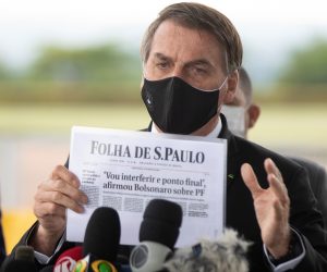 epa08424471 Brazilian President Jair Bolsonaro speaks to reporters at the entrance to the Palacio do Alvorada, in Brasilia, Brazil, 15 May 2020. Bolsonaro played down accusations of interference of the Federal Police corp, arguing he is protecting his family security. Bolsonaro also dealt with the resignation of health minister Nelson Teich on 15 May 2020 less than a month after Teich took the post amid the pandemic crisis in the country.  EPA/Joedson Alves