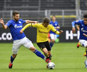 epa08425898 Schalke's Matija Nastasic (L) fouls Dortmund's Thorgan Hazard during the German Bundesliga soccer match between Borussia Dortmund and Schalke 04 in Dortmund, Germany, 16 May 2020. The German Bundesliga and Second Bundesliga are the first professional leagues to resume the season after the nationwide lockdown due to the ongoing Coronavirus (COVID-19) pandemic. All matches until the end of the season will be played behind closed doors.  EPA/MARTIN MEISSNER / POOL DFL regulations prohibit any use of photographs as image sequences and/or quasi-video.