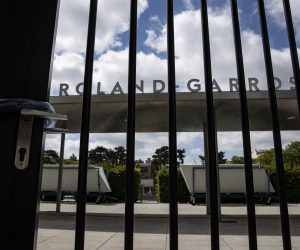 epa08441008 The gates to Roland Garros tennis complex remain shut, in Paris, France, 24 May 2020. The tournament would have started 24 May, but has been postponed along with all sporting fixtures as part of lockdown confinement measures implemented to stop the widespread of the SARS-CoV-2 coronavirus causing the Covid-19 disease. The tournament has put forward new prospective dates, from 20 September to 04 October 2020.  EPA/IAN LANGSDON