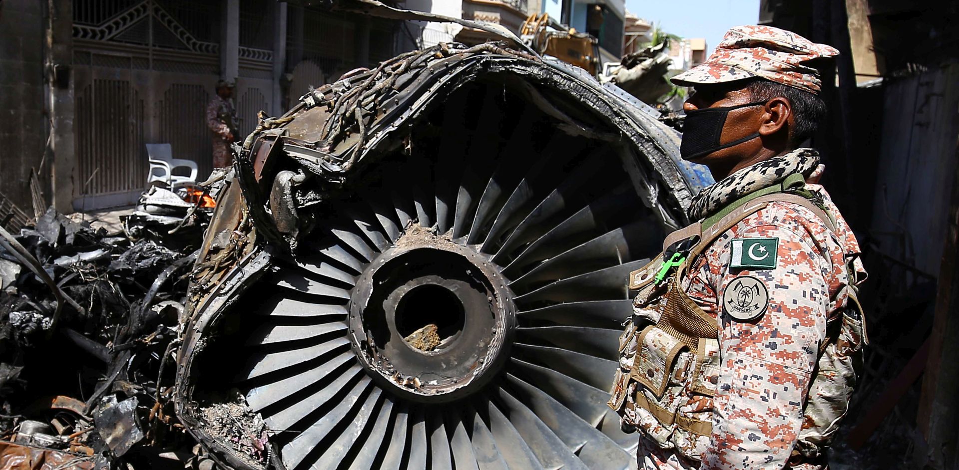 epa08441448 Wreckage of state run Pakistan International Airlines, Airbus A320 is lying amid houses of a residential colony days after it crashed, in Karachi, Pakistan, 24 May 2020. The death toll in a plane crash in Pakistan rose to 97 on 23 May after rescue teams spent the night searching for survivors among the rubble in a residential area in the port city of Karachi, where the state-owned Pakistan International Airlines (PIA) flight with 99 people on board crashed on 22 May.  EPA/SHAHZAIB AKBER