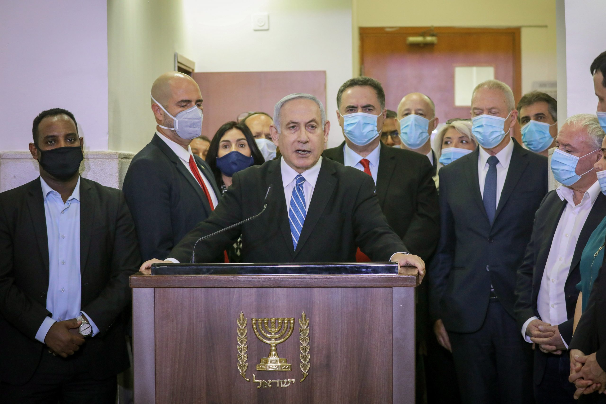 epa08441309 Israeli Prime Minister Benjamin Netanyahu delivers a statement  before entering the district court room where he is facing a trial for alleged corruption crimes in Salah El-Din, East Jerusalem, 24 May 2020. Netanyahu has been charged with counts of bribery, fraud and breach of trust, becoming the first Israeli leader to be tried for alleged corruption while still in office. The trial comes only a week after Netanyahu was sworn into office for another term following a rare power-sharing deal with his adversary, who is set to take over as prime minister in 18 months as he switches roles with Netanyahu, who would then become Gantz's deputy.  EPA/YONATAN SINDEL / POOL