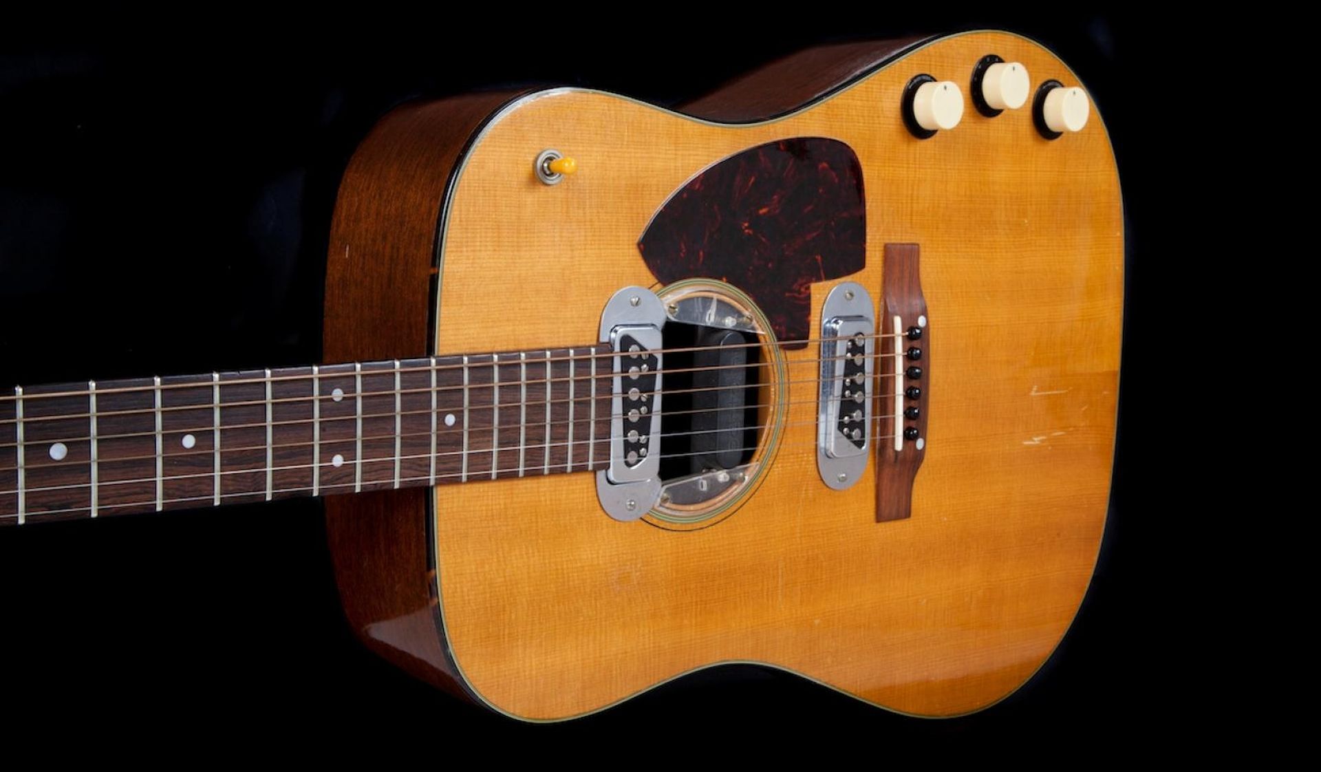 Kurt Cobain's Iconic MTV Unplugged Guitar The 1959 Martin D-18E acoustic guitar played by the late Kurt Cobain during the live taping of "MTV Unplugged" in 1985 is seen in an undated photo before going up for auction in Beverly Hills, California on June 19-June 20, 2020. Courtesy of Julien's Auctions/Handout via Reuters THIS IMAGE HAS BEEN SUPPLIED BY A THIRD PARTY. MANDATORY CREDIT. NO RESALES. NO ARCHIVES Julien's Auctions