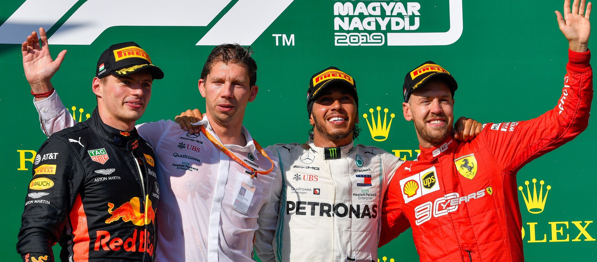 epa08394955 (FILE) - Second placed Dutch Formula One driver Max Verstappen of Red Bull, Chief Strategist of Mercedes team James Vowles, winner British Lewis Hamilton of Mercedes and third placed German Sebastian Vettel of Ferrari (L-R) celebrate on the podium during the award ceremony of the Hungarian Formula One Grand Prix at the Hungaroring circuit, in Mogyorod, Hungary, 04 August 2019  (re-issued on 01 May 2020). On 01 May 2020 race officials announced that, if the Hungarian Formula One Grand Prix scheduled on 02 Agust 2020 will be confirmed, than it will take place behind closed doors and without fans due to the ongoing COVID-19 coronavirus pandemic.  EPA/Zsolt Czegledi HUNGARY OUTHUNGARY OUTHUNGARY OUT *** Local Caption *** 55378621