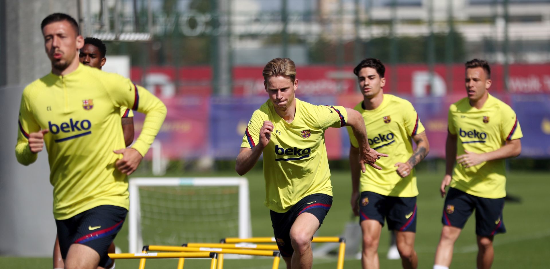 epa08443468 A handout picture provided by FC Barcelona shows FC Barcelona's midfielders Frankie de Jong (C) and Arthur Melo (R) and defender Clement Lenglet (L) during a training session at Joan Gamper Sports City in Barcelona, Catalonia, Spain, 25 May 2020. FC Barcelona began the training sessions on groups of 14 players due to coronavirus health protocol.  EPA/Miguel Ruiz / HANDOUT  HANDOUT EDITORIAL USE ONLY/NO SALES