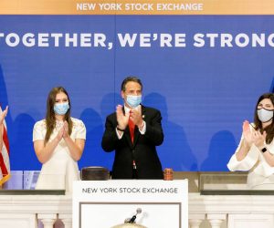 epa08446152 A handout photo made available by the New York Stock Exchange (NYSE) shows New York Governor Andrew Cuomo (C) clap while ringing the Opening Bell of the New York Stock Exchange and standing with NYSE President Stacey Cunningham (R), Melissa DeRosa (L), Secretary to the governor, and Mariah Kennedy Cuomo (2-L), the governor’s daughter, at the New York Stock Exchange in New York, New York, USA, on 26 May 2020. Today is the first day that the stock exchange is reopen for in-person trading after the building was closed in March due to the coronavirus pandemic.  EPA/NYSE HANDOUT  HANDOUT EDITORIAL USE ONLY/NO SALES