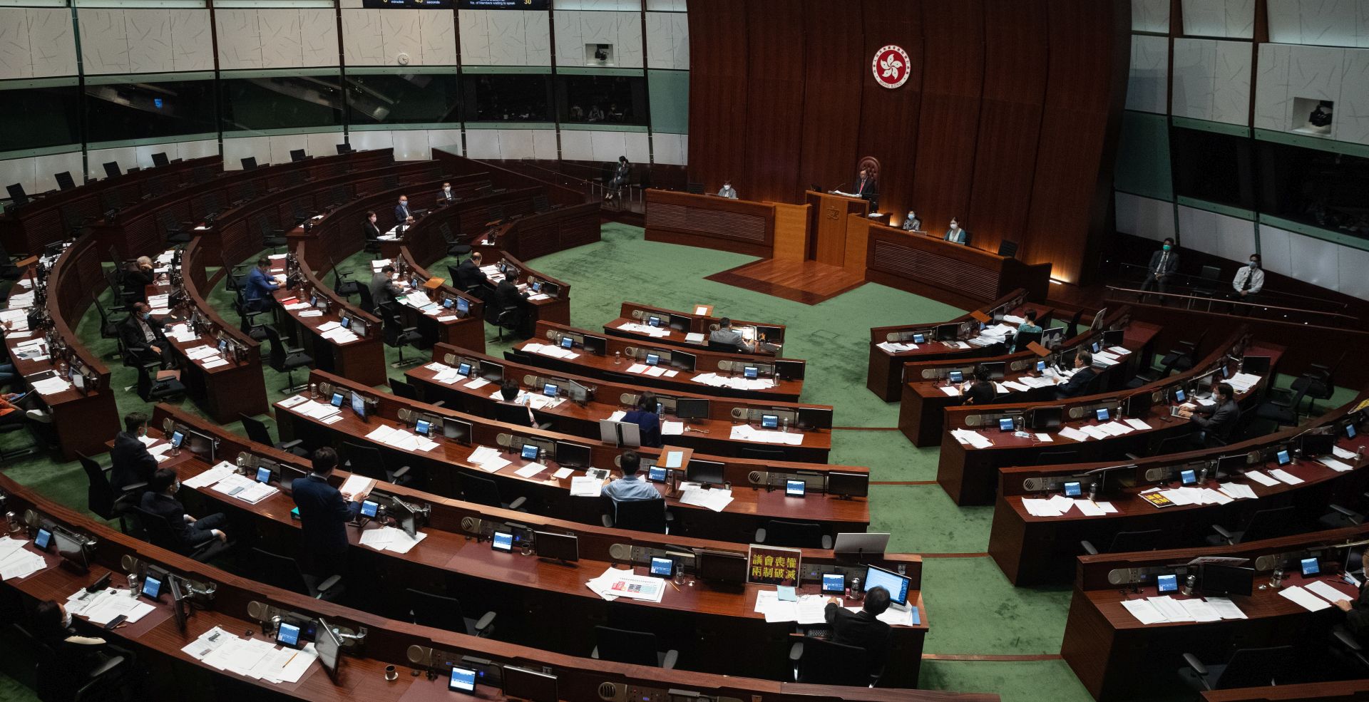 epa08446417 Lawmakers debate the second reading of the National Anthem Bill in the Legislative Council of Hong Kong, China, 27 May 2020. Under the bill, anyone convicted of misusing or insulting the 'March of the Volunteers' (the national anthem of the People's Republic of China) could face a fine of up to 50,000 Hong Kong dollars (6,449 US dollars) and three years in jail. The bill is expected to be put to a vote on 04 June.  EPA/JEROME FAVRE
