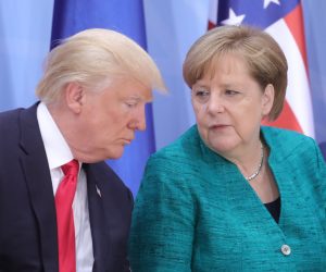 FILED - 08 July 2017, Hamburg: US President Donald Trump (L), speaks with German Chancellor Angela Merkel during a panel discussion at the G20 summit. German Chancellor Angela Merkel has declined an invitation from US President Donald Trump to the upcoming G7 summit "given the overall pandemic situation," a government spokesman said Saturday. Photo: Michael Kappeler/dpa-Pool/dpa