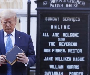 epa08459183 US President Donald J. Trump poses with a bible outside St. John's Episcopal Church after delivering remarks in the Rose Garden at the White House in Washington, DC, USA, 01 June 2020. Trump addressed the nationwide protests following the death of George Floyd in police custody.  EPA/SHAWN THEW