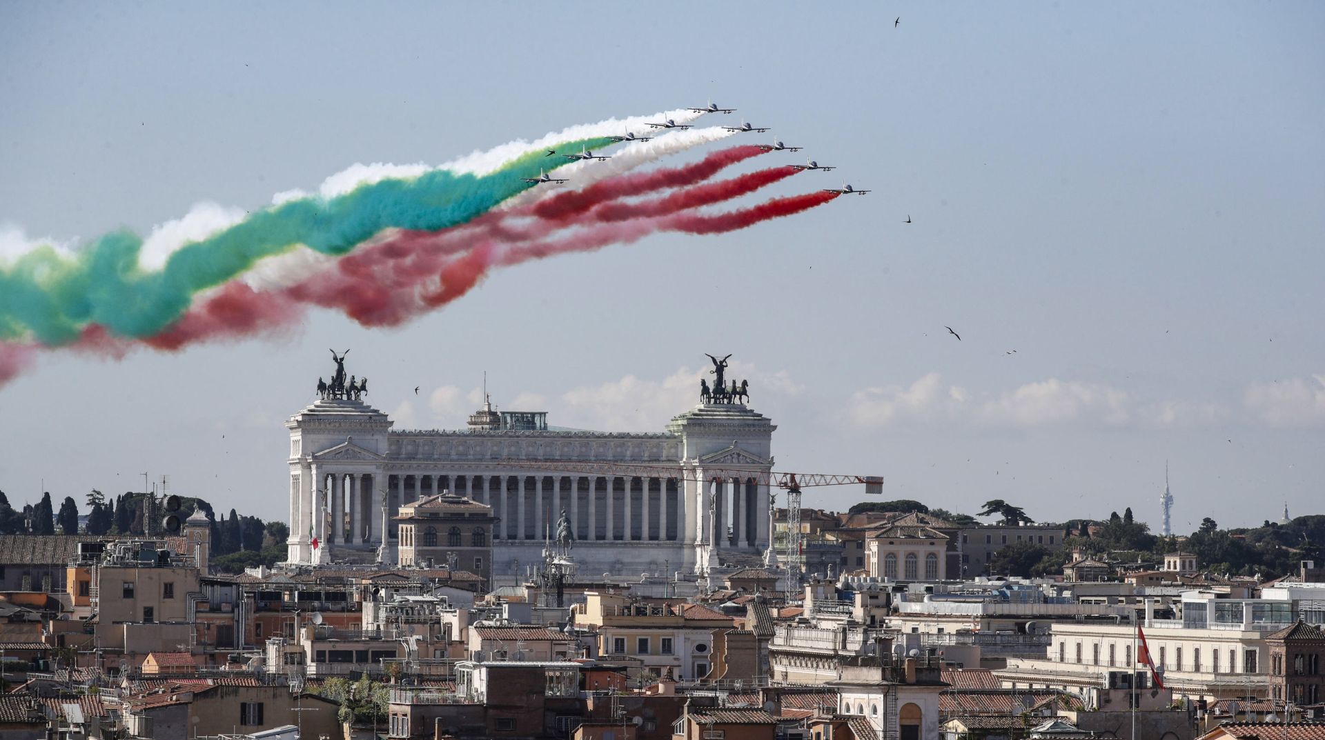 epa08459635 Italian Air Forces aerobatic demonstration team Frecce Tricolori fly during the celebrations of Republic Day, in Rome, Italy, 02 June 2020. The anniversary marks the proclamation of the Italian Republic in 1946.  EPA/GIUSEPPE LAMI
